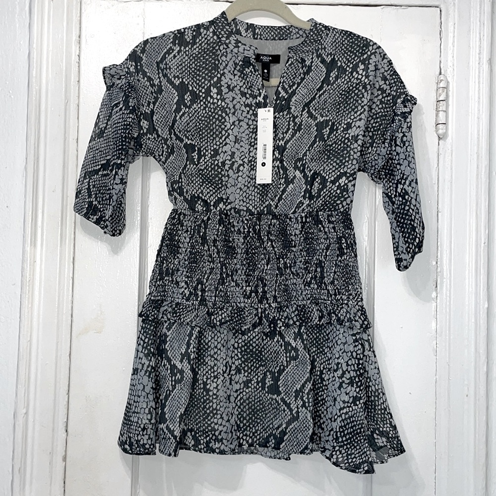 AQUA GIRL DRESS
Size S
Color:snake